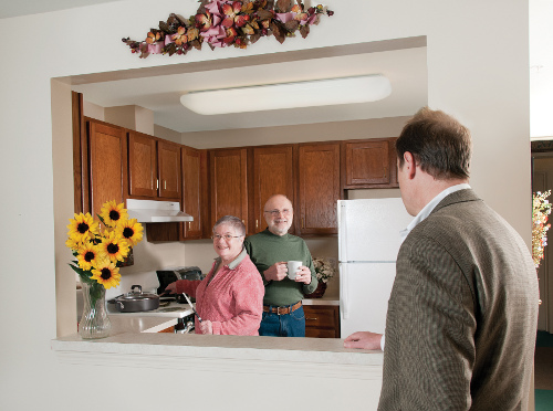 couple in kitchen independent living buffalo